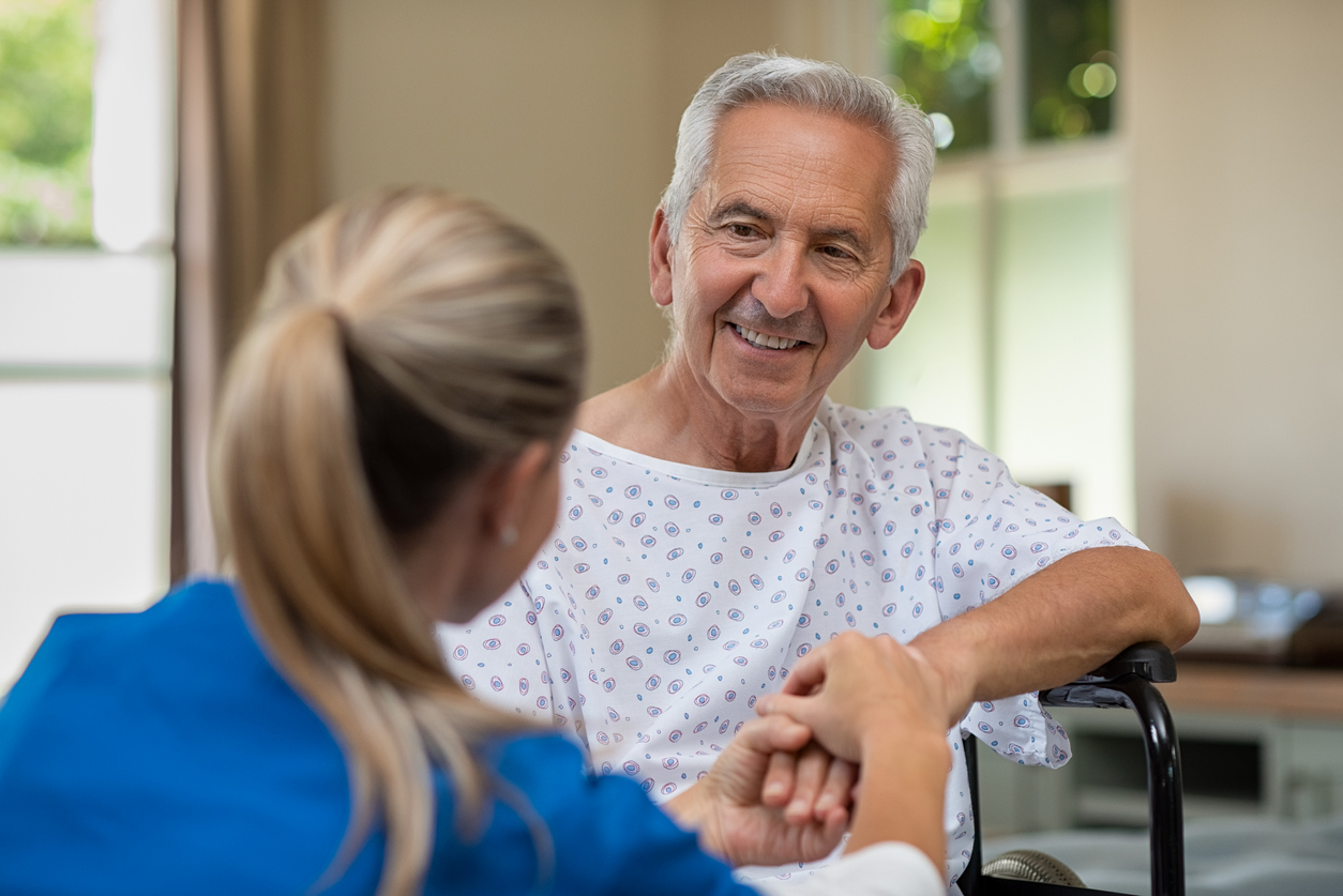 Senior patient with doctor